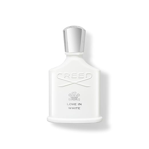Creed Love in White perfume bottle on a white background