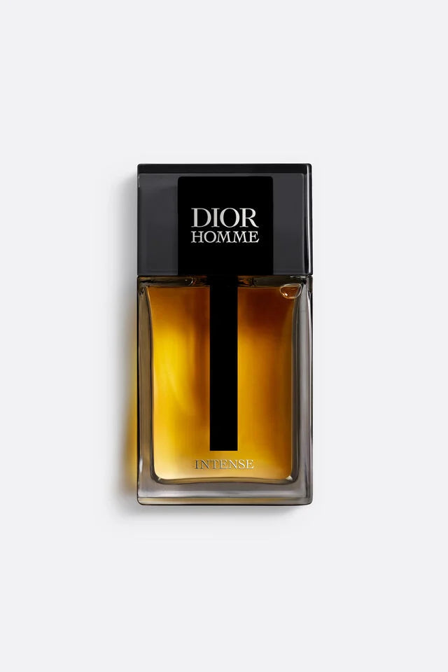 Dior Homme perfume bottle on a light gray background