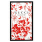 Gucci Bloom perfume packaging with red floral design on a white background