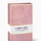 Pink and gold packaging of 'Good Girl' by Carolina Herrera on a white background